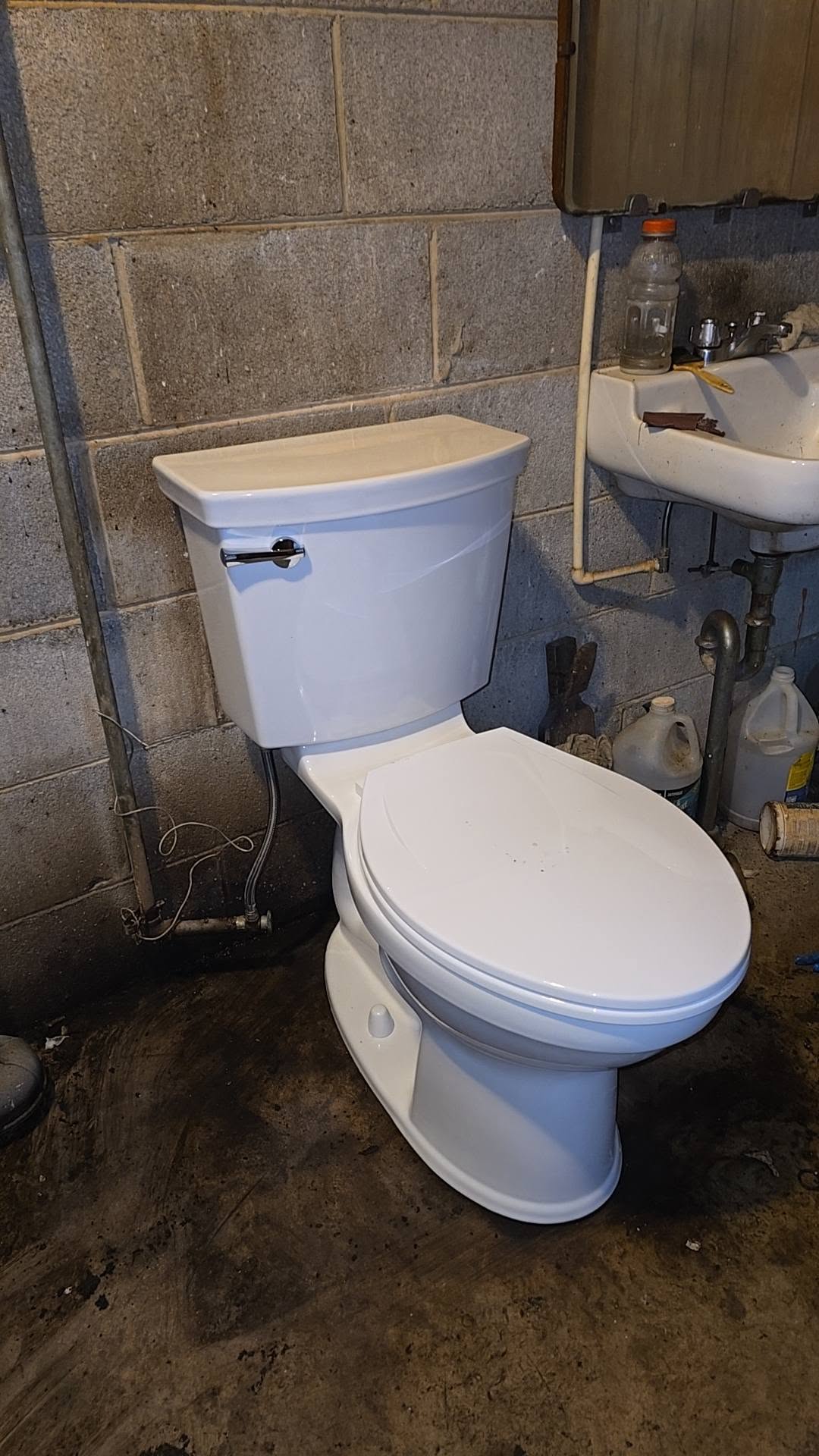 The same toilet reset and finished after the repair